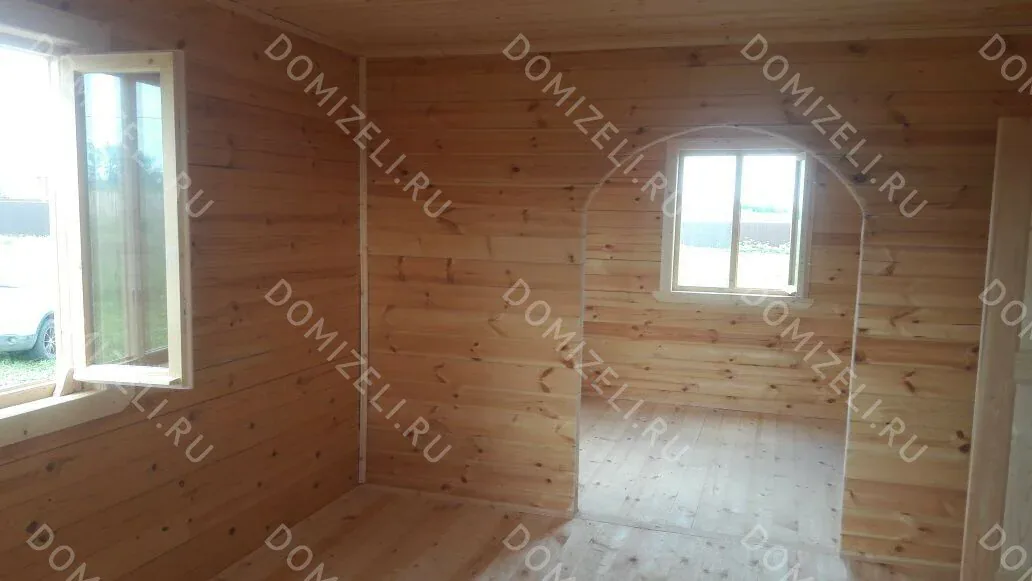 Дом из бруса 8×9 с двумя балконами