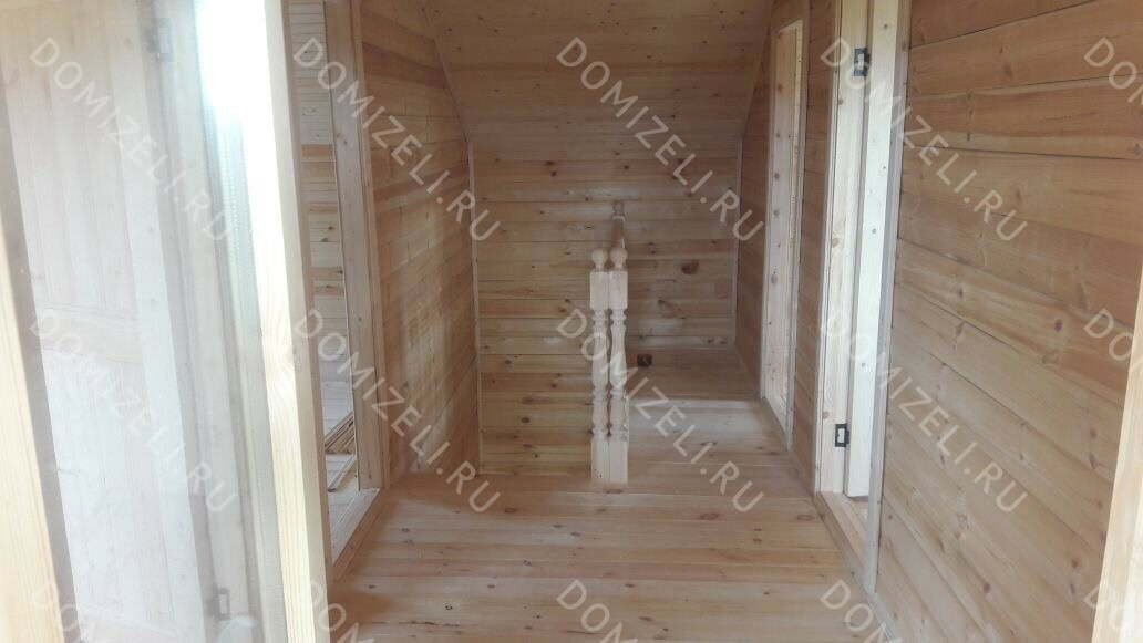 Дом из бруса 8×9 с двумя балконами